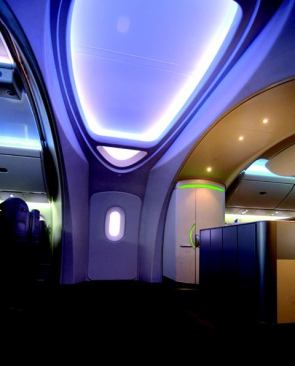 Starting at the entryway, vaulted arches appear repeatedly throughout the airplane cabin, emphasizing the soaring ceiling while creating well-defined architectural boundaries. 