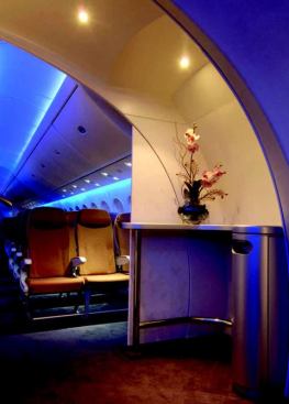 The new interior configuration also features strategic cabin breaks, including a galley (above), providing passengers with defined areas in more room-like proportions. The dynamic lighting scheme continues throughout the cabin, from business class to coach.