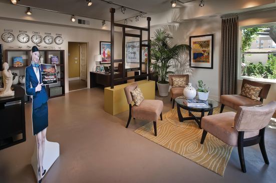 The first floor of the live/work model shows what a travel agency would look like in the unit.