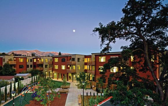 An underground parking garage maximizes above-ground open space.
