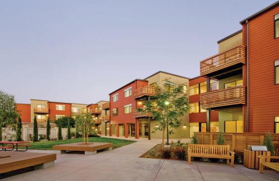 Site circulation was planned to allow emergency vehicle access but to keep cars from driving through the site, which gives residents maximum use of the outdoor area between the two buildings.