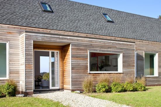 The owners’ plan for a future 6.5 kW solar electric system on the large south-facing roof would make the house net-zero energy.