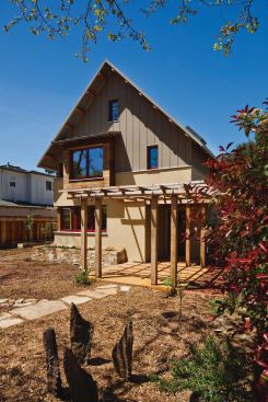 A 5-kW PV array, set at the rear of the roof to avoid shading from street trees, is designed to bring the house to net-zero energy and charge an electric car. The system includes micro inverters, rather than the standard single large inverter, to minimize temporary shading effects from clouds. It’s estimated to increase energy production by 15% and reduce the required number of PV panels on the roof.