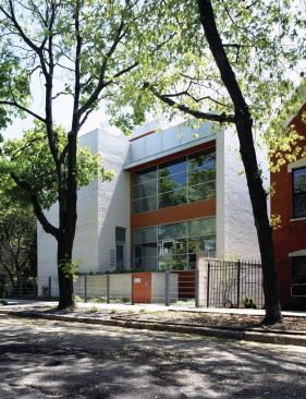 Mark Peters and his team prefer to limit their palette to just a few materials and hues. At Bucktown One, for example, the exterior materials are ground-face masonry and cedar. 