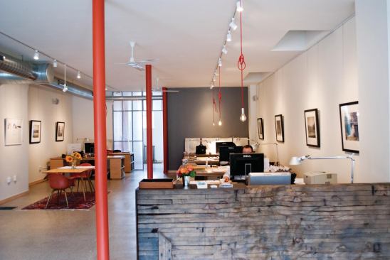 The architects covered the front desk in wood salvaged from the interior of a grain silo.