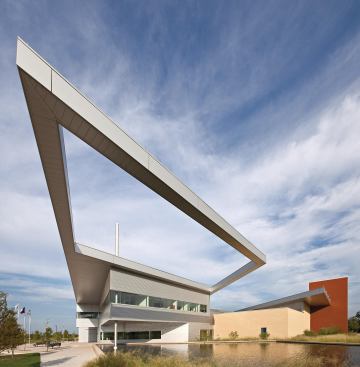The construction of the 50-foot-long projecting roof on the new Perkins+Will–designed Public Safety Building in Lancaster, Texas, was not without its nail-biting moments. The entire steel assembly for the double cantilever was manufactured off-site and installed using supports. Once the welds were complete and the post-tension cables secured, the supports were removed and the cantilever was allowed to settle into place.