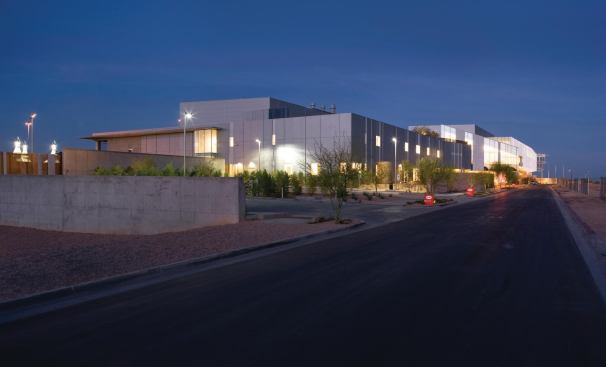 Employees enter the building from a side entrance that also leads to three levels of below-grade parking.   So as not to minimize the entry experience for those commuters, careful attention was paid to landscaping the site with native plant species and using light and graphics in the underground parking area to create a meaningful arrival experience.
