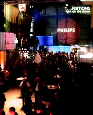 The festivities during the exhibition "Transitions: Light on the Move" (above). 