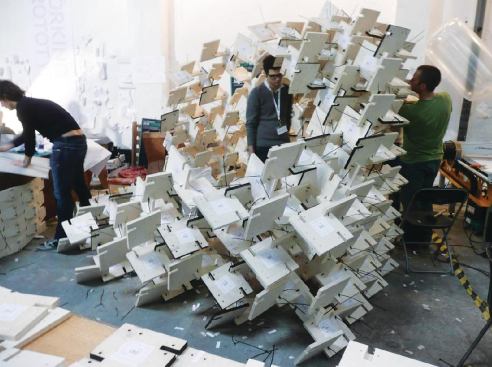 "High-Tech Design, Low-Tech Construction" assembled a "habitat" out of zip ties and two types of laser-cut wood tiles, precisely arranged.