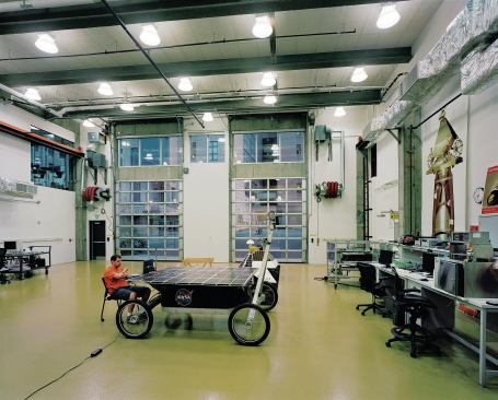 Other, necessarily enclosed, spaces such as almost 120 faculty offices, classrooms, and laboratory high bays (shown) are connected to the rest of the building and campus through extensive use of glazing.