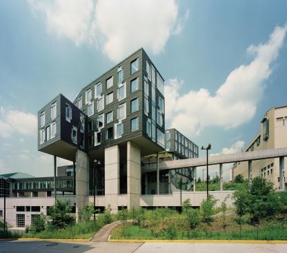Faced with a hilly site in the center of campus, and a program that required more than 200,000 square feet of classroom, office, laboratory, and study spaces, Mack Scogin Merrill Elam Architects raised the bulk of the new Gates Center for Computer Science and Hillman Center for Future-Generation Technologies above its hillside site, creating a cantilevered complex that seems to hang in midair.