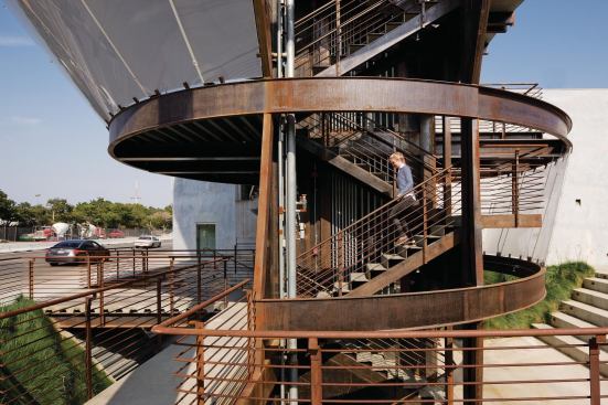 Running vertically through all five floor plates is a circulation stair and adjacent glass-enclosed elevator shaft, which will allow visitors to climb to the top and enjoy views from the balconies at every level or attend events in the acrylic-enclosed spaces.