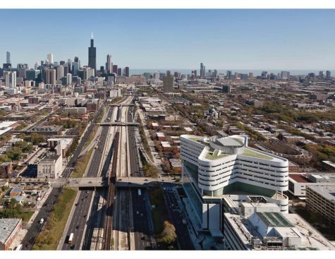 Aerial view of the new hospital tower at Rush University Medical Center, with downtown Chicago in the distance.