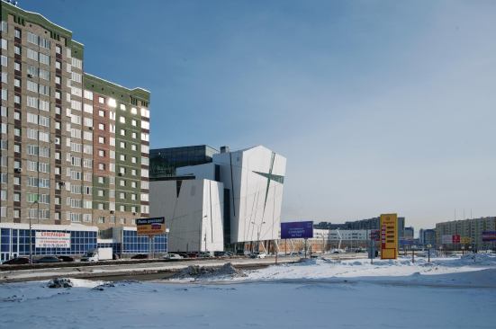 The Vershina Trade and Entertainment Centre provides an indoor space where residents of Surgut, Russia, can escape the Siberian landscape and still-nascent urban context.