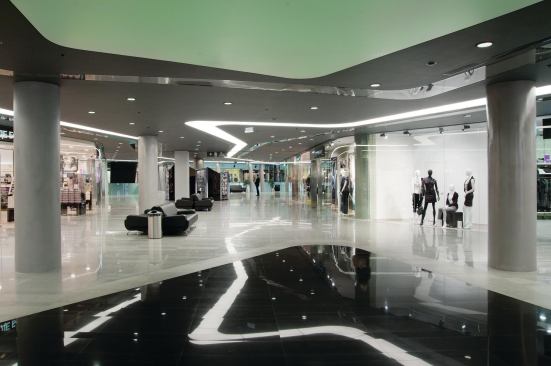 A typical retail floor has storefronts and kiosks, paired with places to sit and meet people, as many of Surgut’s residents use the space less for directed shopping, and more as a community hub. 