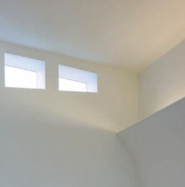 The perimeter covelight is designed to look as if a layer of the wall is being peeled away to reveal the light. 
