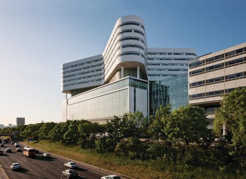 The façade of the lower floors of the building along the Eisenhower Expressway was conceived as a billboard, clad in a curtainwall from ASI. The patient tower is wrapped in metal panels from Sobital, with Viracon windows admitting daylight to perimeter patient rooms.