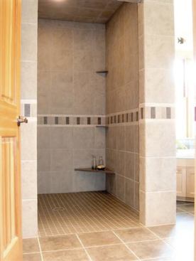 Architect Rosemary McMonigal chose to use materials for both bathrooms that offer accessibility without looking institutional.