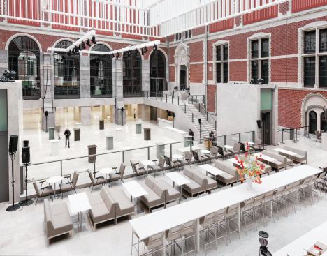 A café overlooks open exhibition space in the eastern courtyard. 
