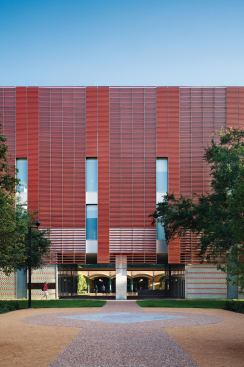 The building's southern-most façade is clad in a screen of terra-cotta baguettes that help minimize heat gain and blend with the other, predominantly brick buildings on campus.