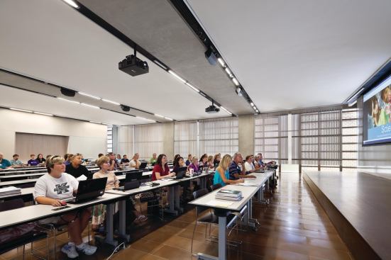 Classrooms offer views out though the varied façade conditions.