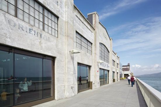 The architects preserved as much of the historic industrial signage as possible on the shed building along the Bay View Walk on Pier 15.