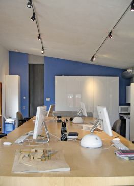 Inside the studio, everyone sits together at one table. "We're all working in a close, collaborative manner," Rosano says of the plan.