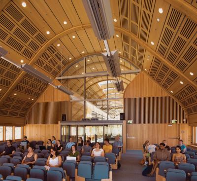Kroon Hall has several types of classrooms to accommodate different styles of courses. This auditorium has theater seating and acoustic material behind red oak slats along the back wall to prevent sound reverberation. The Douglas fir–laminated louvers on the exterior admit daylight while at the same time reducing glare.Sunshading

MechoShade Systems



ElectroShade system for motorized shades

mechoshade.comMillwork

Legere Woodworking



Cabinetwork and custom woodwork

legeregroup.com