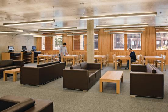 A study area on the south face of the building's ground floor looks out onto a colonnade and courtyard that students can use as an outdoor study and socializing area during the warmer months. Previously occupied by parking lots and a gas power plant, the new outdoor space better connects with the other campus buildings. Operable windows allow natural ventilation and communication back and forth between students inside and out.Carpet

InterfaceFLOR



Menagerie modular carpet tiles

interfaceflor.comWindows

Marvin Windows and Doors



Custom windows

marvin.comLounge seating

B1 sofa



Bernhardt Design

bernhardtdesign.com
