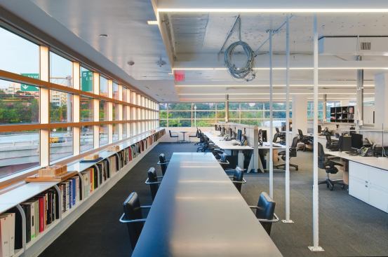 The design studio has an egalitarian setup: Even the firm executives sit at workstations in the open-plan space. Employees can expect to move around as project teams form clusters and groups are reorganized when new work comes into the office.

Carpet

Interface Global



Customized First Ave. carpet tile

interfaceglobal.comWindow Shades

MechoShade



Motorized concealed shades

mechoshade.comMonitor Mount

Humanscale



M4 monitor mounts

humanscale.comFurniture System

Knoll



Current System furniture

knoll.com