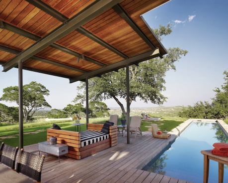 A commodious custom sofa is the designated spot for lounging and naps.