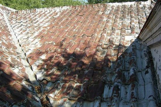 The roof had a major valley rafter cut in the attic that had to be restructured. The valley pitch had to be altered slightly to control the flow of water to the hidden gutters.