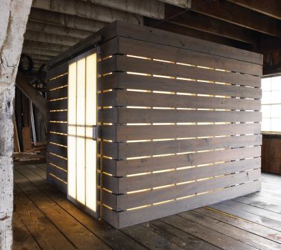 By night, the glowing bath cube becomes a destination for guests in need and a night-light for owners.