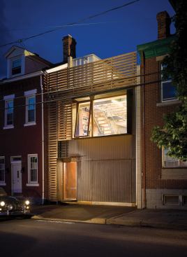 residential architect  June 2008  workspace  studio d'arc architects  pittsburgh   Gerard Damiani, AIA, NCARB, and Debbie Battistone wanted their new live/work locale to embrace Pittsburgh's urban fabric. So they scouted for an empty lot close to downtown. The ample glazing lets the husband-and-wife team forgo artificial lighting during the day—a big plus for the eco-conscious firm.