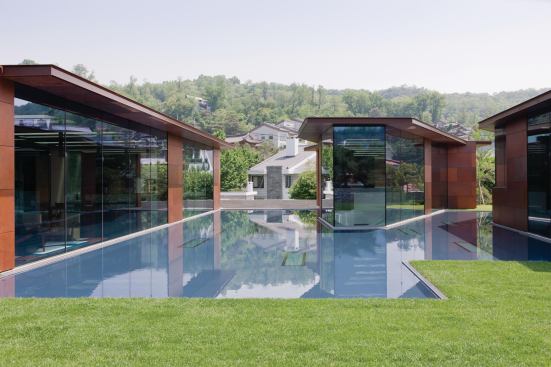 Pavilions with a garden-level reflecting pond.