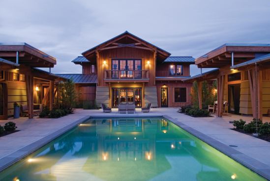 Surrounded by acres of productive Zinfandel vines, this family compound makes reference to the vintners art with a wine cellar in the form a barrel.


