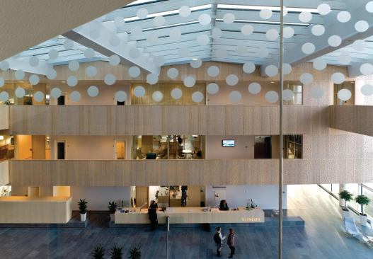 The interior of the House of Vestas is purposefully light and airy to contrast with the dark exterior.
