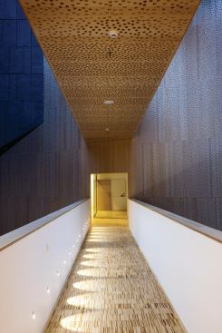 Each office wing is linked via open  walkways.
