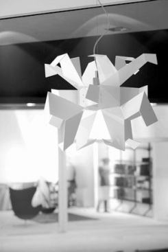 Designer Vicente García Jiménez's work explores color, form, surface, shape, and light. His pendant luminaires called Big Bang, created for Italianlighting company Foscarini, explore planar sculptural compositions and how these forms interact with light.