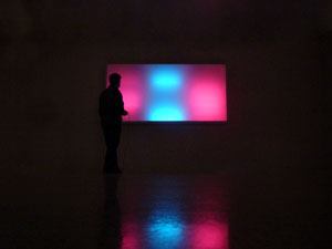 The work of media artist James Clar explores new forms of visual communication merging art and technology. Boom Box is a 4-foot by 8-foot interactive light object that analyzes sound levels to create dynamic light animations.