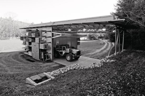 Tractor backing into storage area