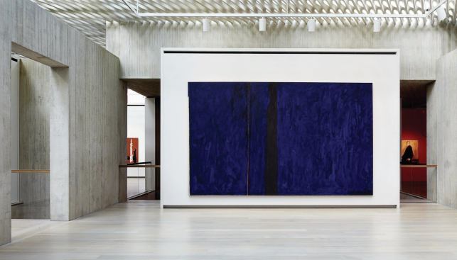 Finely-tuned daylight filtering through the concrete ceiling illuminates the large gallery spaces. Smaller galleries beyond house light-sensitive works on paper.