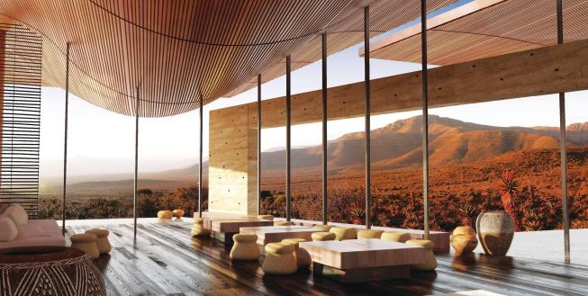 The cupped roofs, clad in insulating gum-poles on the underside, define interior spaces such as the lodge. 