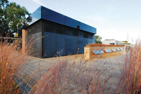 The house is clad in a Distributed Responsive System of Skins prototype that includes deployable exterior shades over quadruple-glazed IGUs and a series of building-integrated photovoltaic panels that generate electricity. The skin allows maximum light transmittance while retaining heat for passive heating in the winter months, and the shades can be deployed to reduce heat gain during the summer.