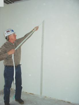 Removing Green-Sip Tape for Demounting Partition.