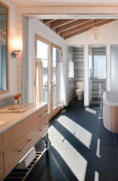 The architects designed many of the home's built-ins, such as the bath vanities and tub surrounds.