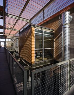 Atrium with pop-out box containing a conference room