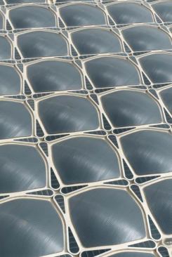 To combat the intense heat of the Jordanian summers, the architects capped the exterior surface of the precast concrete domes with a metal cladding that serves as a heat shield. “The metal standing-seam roof is raised above the concrete domes to form a cavity for air to vent any possible buildup of heat,” Parr explains.