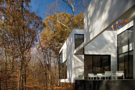 At the Graticule Residence in Great Falls, Va., Jameson again challenged conventional notions of indoor and outdoor space, providing an upper wall that shelters a terrace and lends privacy to the interiors.