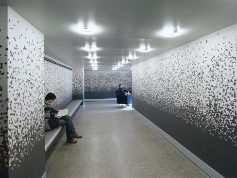 Study spaces cut into the corridors.